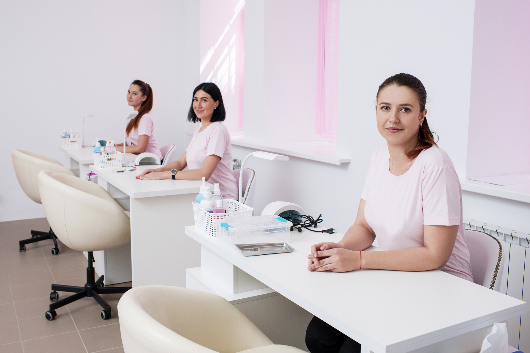 Beautician team in salon interior